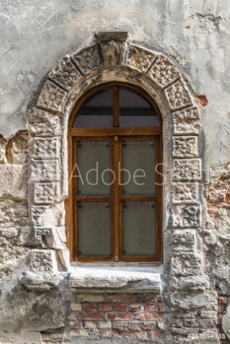 Bild på Old window on ancient wall